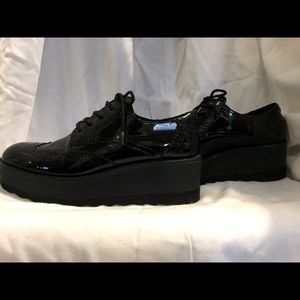 Black patent leather platform shoes